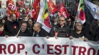 Protesters demonstrate in the French eastern city of Lyon as part of the European Day against austerity plans. Banner reads: 'Enough is enough