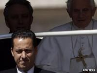 The Pope's butler, Paolo Gabriele (bottom left) arrives with Pope Benedict at the Vatican (23 May 2012).