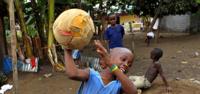 Boy plays with a football in Malabo