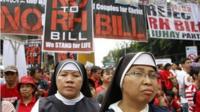 File photos of nuns marching in protest against the Reproductive Health Bill