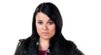 Actress Dani Harmer wearing a black jacket and looking at the camera