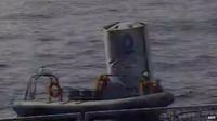 South Korean sailors transport debris from North Korea's rocket on 12 December 2012, in image released by South Korean defence ministry