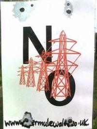 Poster yn erbyn cynllun peilionau ynni ym Mhowys