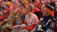 Dozens of clowns attended the church service at Holy Trinity Church in Dalston