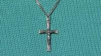 A crucifix on a necklace