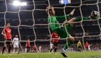 David de Gea of Manchester United makes a save with his foot