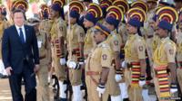 British Prime Minister David Cameron with Indian police