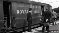 Police examine the train used in the Great Train Robbery