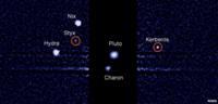 Hubble image showing moons of Pluto