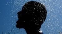 Man in shower in Cyprus
