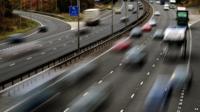 motorway with blurred cars on it