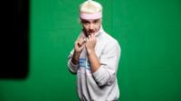 Liam from One Direction dressed in tennis gear
