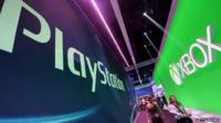 Playstation and Xbox signs.