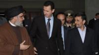 Sheikh Hassan Nasrallah, Bashar al-Assad and Mahmoud Ahmadinejad (file photo)
