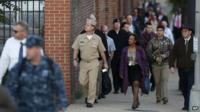 Military personnel and workers returned to work at the Washington Navy Yard on 19 September 2013