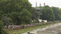 The long queue for entry to Battersea Power Station in London on Sunday