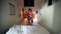 Man in hotel bedroom