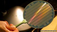 Hand holding carbon nanotube wafer