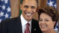 US President Barack Obama and Brazilian President Dilma Rousseff pose during a joint press conference at Planalto Palace in Brasilia on 19 March, 2011