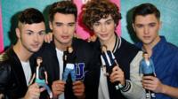 Union J with look alike dolls
