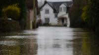 House at the end of a flooded street