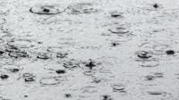 rain drops in a puddle
