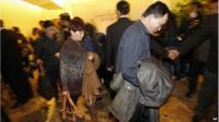 Chinese relatives of passengers aboard a missing Malaysia Airlines plane