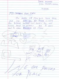 Dahir Mohamed's letter has two hearts drawn on it, one with a flag of Somalia and another of Syria, with the words "brother and sister" in between