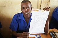 Zakariye holds up his letter