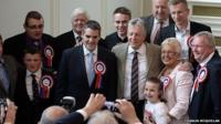 Peter Robinson greets councillors at city hall