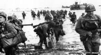 US troops landing on beach in Normandy, D-Day.