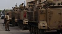 Pakistani troops after attack on Karachi airport. 9 June 2014