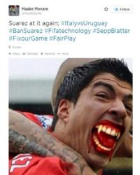 Image taken from Twitter of Suarez with fangs
