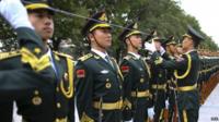 Papers say China military might is aimed keeping the world peaceful