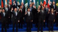 World leaders wave during the G20 Summit in Brisbane, Australia on 15 November 2014