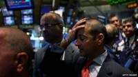 Traders on the floor of the New York Stock Exchange on 16 September 2008