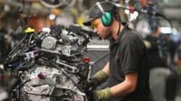 man in car factory