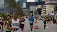 Competitors run in Hong Kong"s first inner city ultra marathon on March 1, 2015