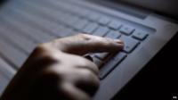 Person using a computer keyboard