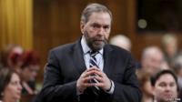 New Democratic Party leader Thomas Mulcair responds to the government's plan to expand its military mission against Islamic State in the House of Commons on Parliament Hill in Ottawa 24 March 2015