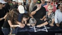 Relatives mourn four-year-old Daniel Tregerman at his funeral in Israel