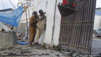 Somali soldiers take position after an attack on a hotel in Mogadishu Somalia, Friday, March, 27, 2015