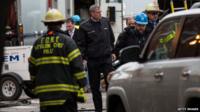 New York City Mayor Bill de Blasio surveys the damage on Friday