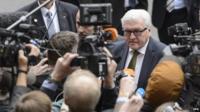 German Minister of Foreign Affairs Frank-Walter Steinmeier speaks to journalists as he arrives for a new round of Iran nuclear talks, in Lausanne, Switzerland