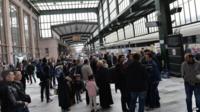 People wait at a train station in Ankara after a massive power cut, 31 March 2015