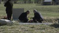 Thomas Winkelmann, chief executive of Germanwings, and Carsten Spohr, head of the parent company Lufthansa, lay flowers for the victims of the Alps crash