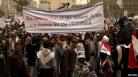 Supporters of Yemen's former President Ali Abdullah Saleh participate in a rally against air strikes in Sanaa 3 April, 2015