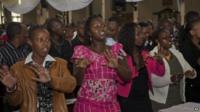 Kenyan Christians sing during a morning service at Holy Family Basilica, Nairobi, Kenya on 5 April, 2015