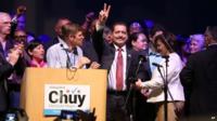 Supporters of Chicago mayoral candidate Jesus "Chuy" Garcia cheer as Garcia takes the podium to concede the runoff election at the UIC Forum, Tuesday, April 7, 2015,