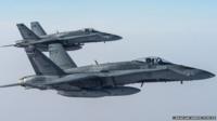Two Canadian CF-18s struck an Islamic State garrison near Raqqa, Syria